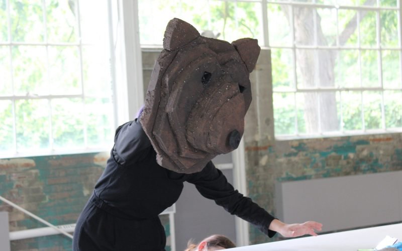 Mya Wong holding Bear Puppet in Workshop of Mirror